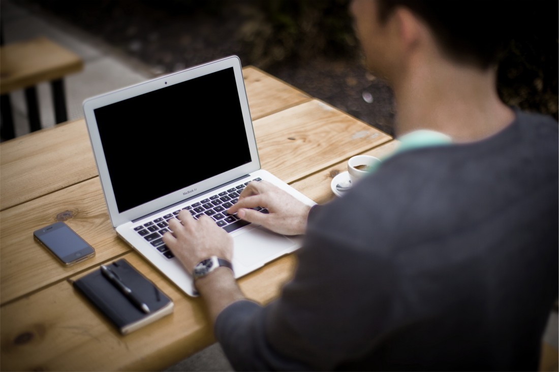 Man sitting at laptop